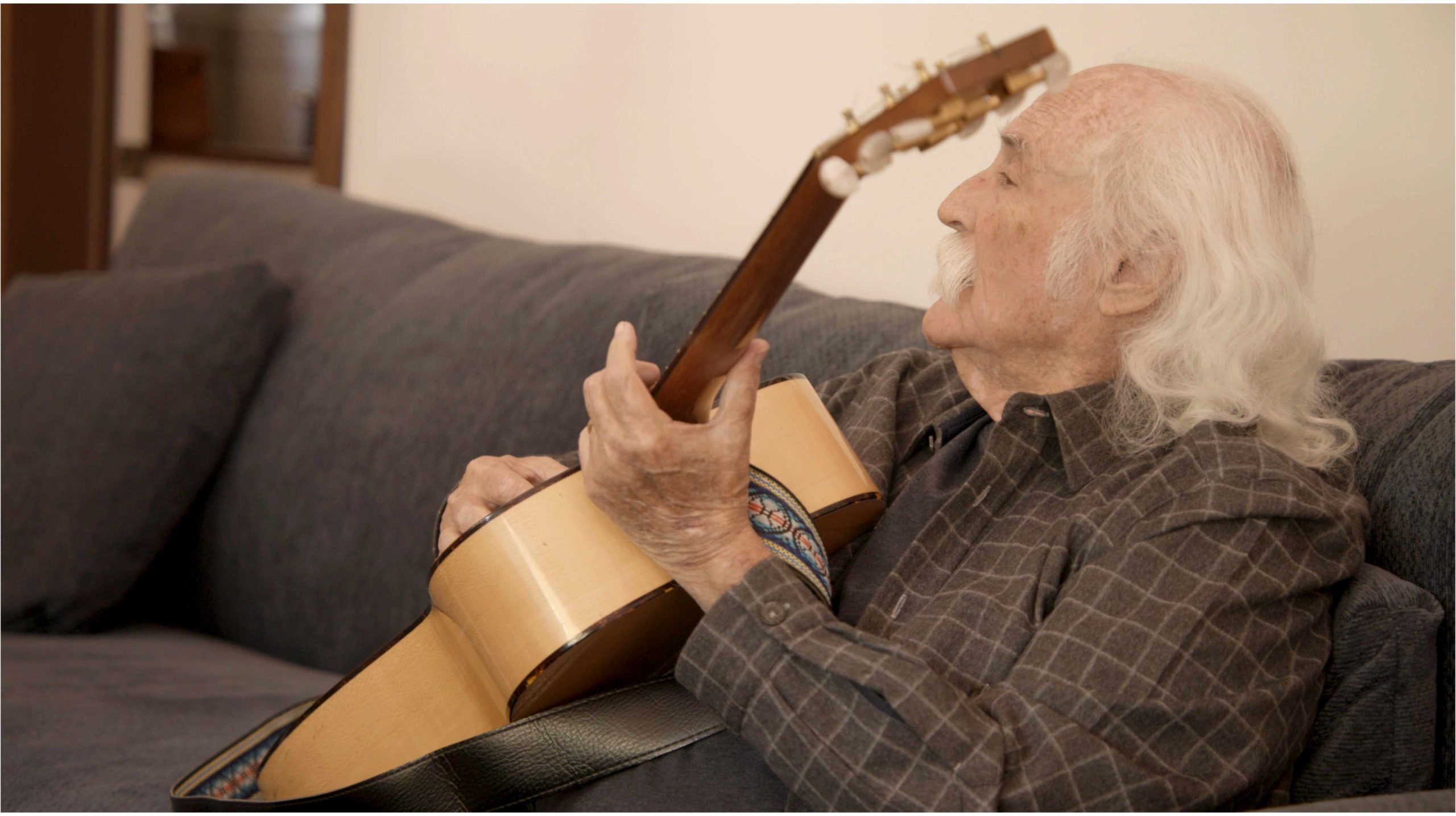David Crosby plays guitar during documentary interview (Photo Credit: Jeremy Belanger)
