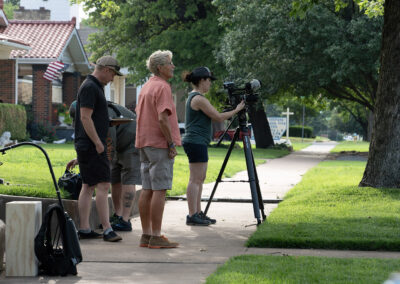 Film crew prepares to interview Carol and Craig Hedges outside of Michael's family home in Enid, OK. Photo credit: Brian Malone.