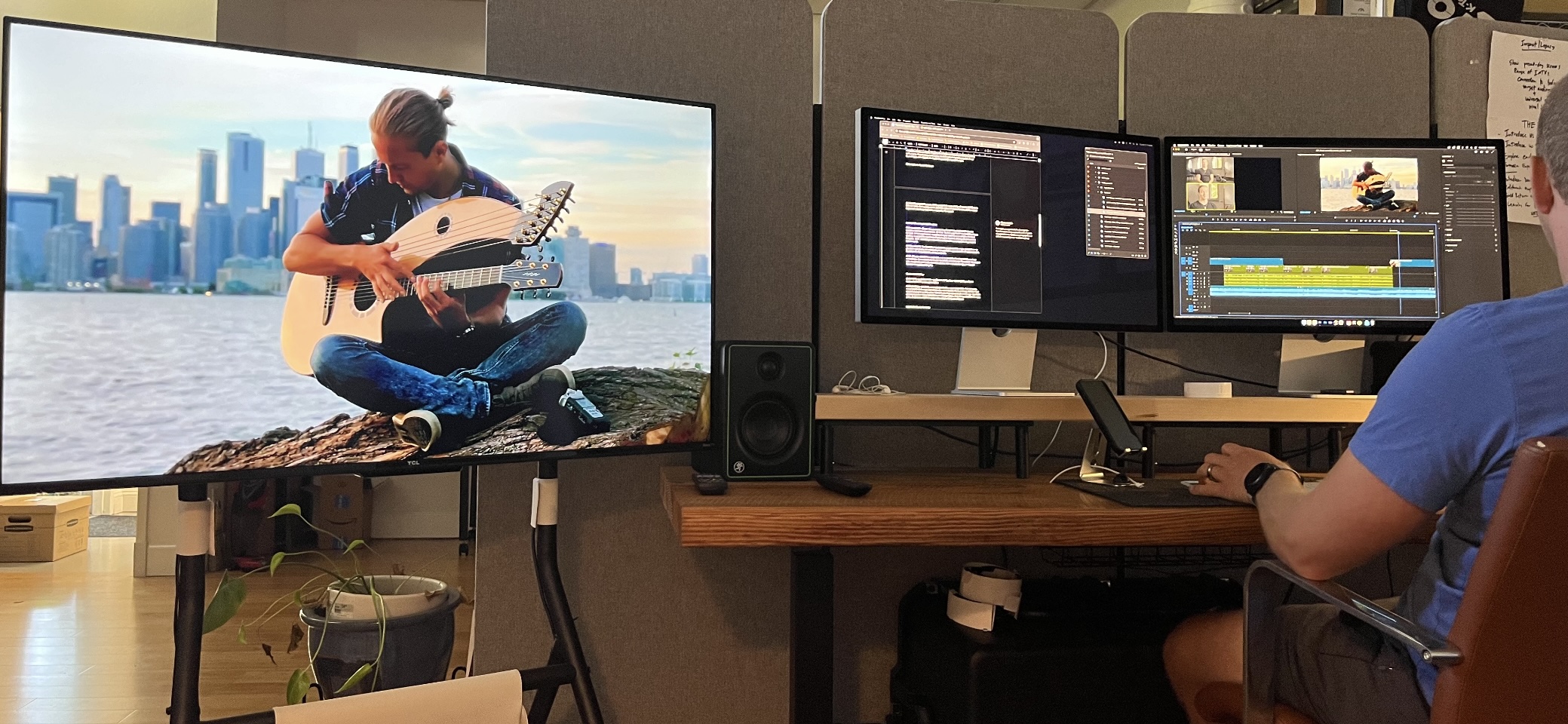 Filmmakers editing footage of guitarist Calum Graham