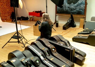 Photographer Jay Blakesberg photographs Michael's guitars. Photo Credit: Monica Semergiu