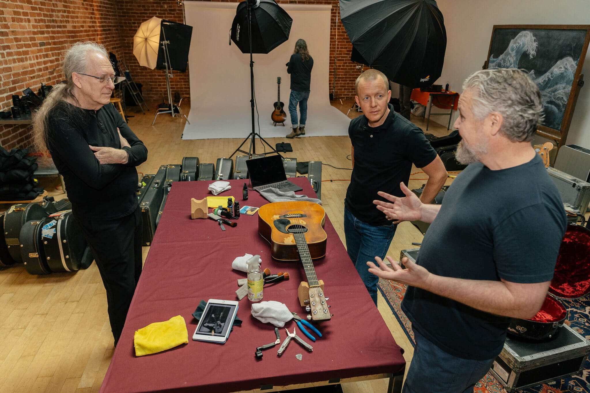 Jake White shares a story about "Barbara", Michael's Martin D-28. Photo Credit: Monica Semergiu