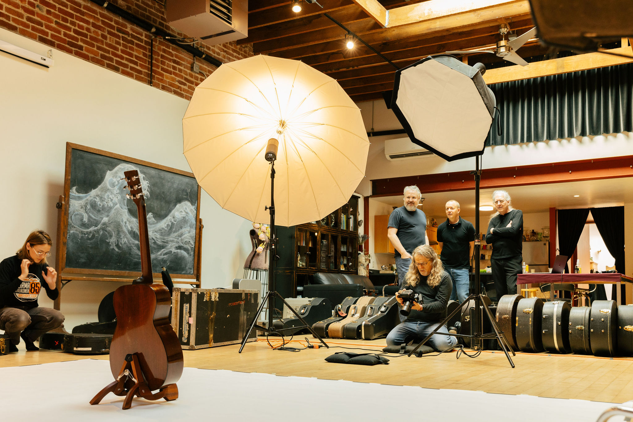 Photographer Jay Blakesberg and his assistant on set, with Jake White, Mischa Hedges and Hilleary Burgess. Photo Credit: Monica Semergiu