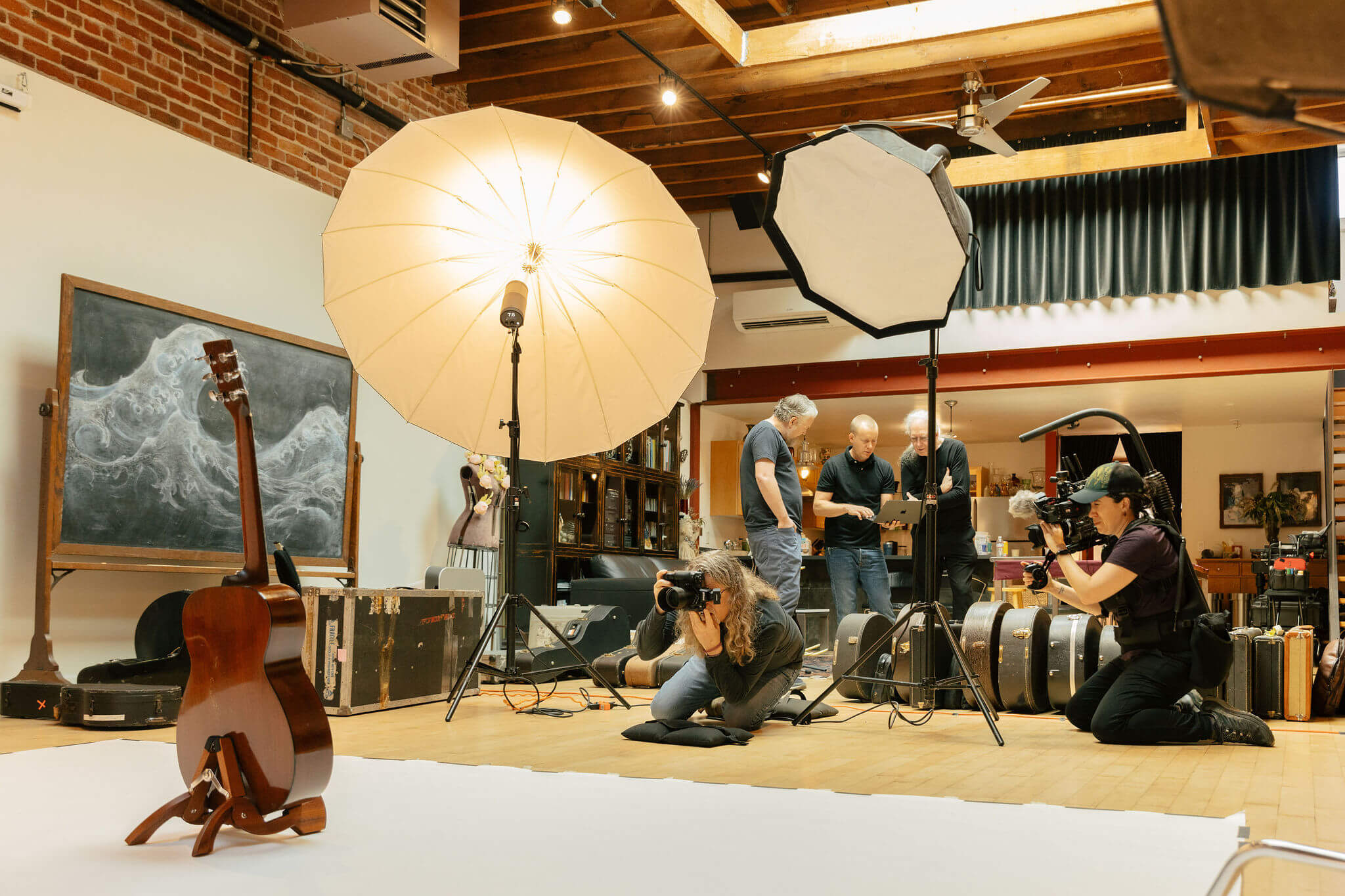 Photographer Jay Blakesberg photographs the guitars of Michael Hedges. Photo Credit: Monica Semergiu Photographer Jay Blakesberg photographs the guitars of Michael Hedges. Photo Credit: Monica Semergiu