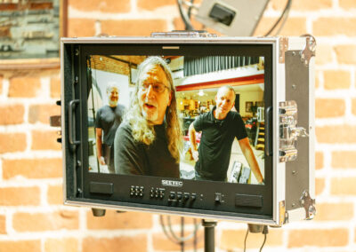 Oncscreen: Jay Blakesberg and Mischa Hedges review guitar photos. Photo Credit: Monica Semergiu