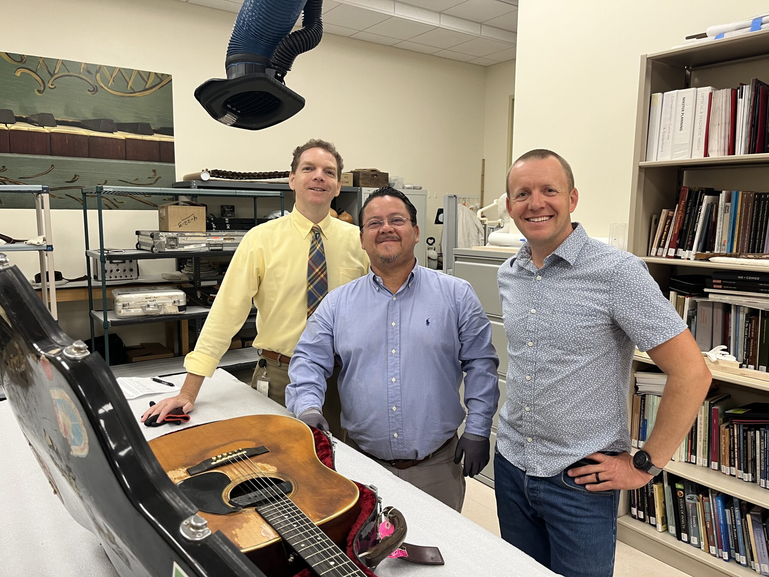 MIM's senior curator Rich Walter, conservator Rodrigo Correa-Salas and Mischa Hedges with "Barbara". Photo Credit: Brendan Hedges