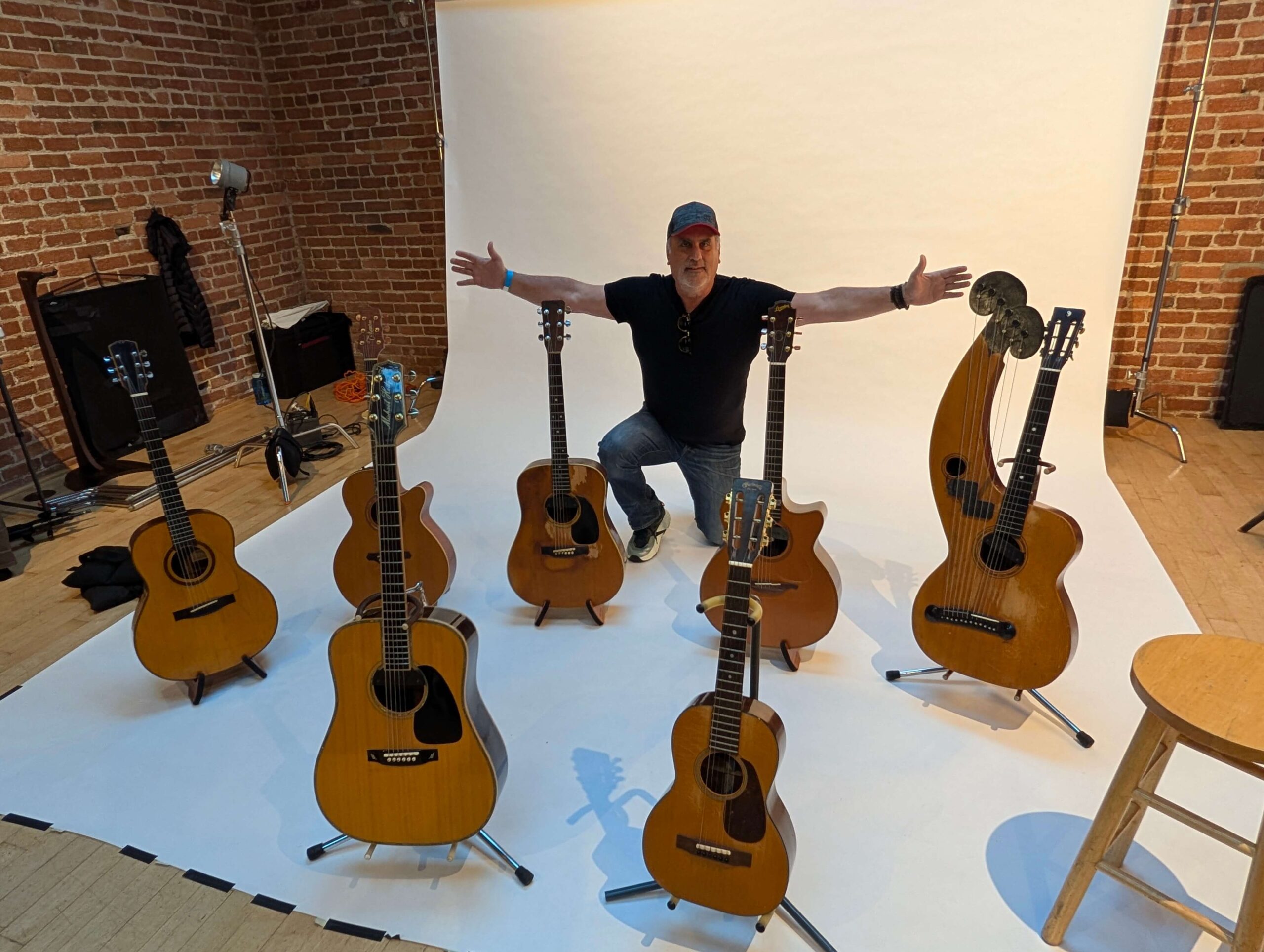 Oracle Associate Producer Sergio De Acha admires Michael's guitars. Photo Credit: Sergio De Acha